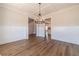 Elegant dining room featuring hardwood floors, wainscoting, large windows, and a chandelier at 257 Pinewood Dr, Covington, GA 30014