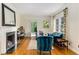 Comfortable living room featuring hardwood floors, fireplace and lots of natural light at 277 Alberta Ne Dr, Atlanta, GA 30305