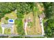 Aerial view of lush, green neighborhood, showcasing yards and community layout at 3060 Robertswood Dr, Powder Springs, GA 30127