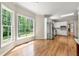Bright eat-in kitchen featuring a stainless fridge and a breakfast nook with views of the backyard at 3060 Robertswood Dr, Powder Springs, GA 30127