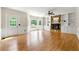 Spacious living room with hardwood floors, fireplace, and built-in shelving at 3060 Robertswood Dr, Powder Springs, GA 30127
