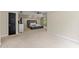 Expansive main bedroom with plush carpeting, neutral tones and view to ensuite bathroom at 3060 Robertswood Dr, Powder Springs, GA 30127
