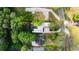 Contemporary home with a sleek pool, modern design, and mature landscaping at 3740 Powers Ferry Nw Rd, Atlanta, GA 30342