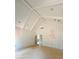 Unfinished bedroom featuring a vaulted ceiling with white beams and double doors at 933 Mount Carmel Church Ln, Canton, GA 30114