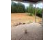 Unfinished patio with brick flooring and views of the surrounding landscape at 933 Mount Carmel Church Ln, Canton, GA 30114