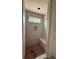 New shower featuring patterned tile, a built-in niche, and a bench at 933 Mount Carmel Church Ln, Canton, GA 30114