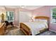 Cozy bedroom with a playful rocking horse, warm wood accents, and a soft color palette at 1130 Angelo Ne Ct, Atlanta, GA 30319