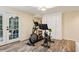 Bright home gym features modern exercise equipment and convenient outdoor access at 1130 Angelo Ne Ct, Atlanta, GA 30319