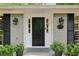 Close-up of the front door showcasing the house number, stylish lighting, and well-maintained entryway at 1130 Angelo Ne Ct, Atlanta, GA 30319