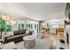 Spacious living room with hardwood floors, a fireplace, and an open floor plan at 1130 Angelo Ne Ct, Atlanta, GA 30319