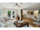 Bright and airy living room with hardwood floors and a backyard view at 1130 Angelo Ne Ct, Atlanta, GA 30319
