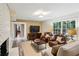 Comfortable living room with a fireplace, TV, and ample seating in a bright, inviting space at 1130 Angelo Ne Ct, Atlanta, GA 30319