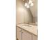 Beautiful bathroom with granite countertops, stylish light fixture, and a large mirror reflecting the commode at 1295 Kilmington Ct, Alpharetta, GA 30009