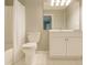 Bright bathroom with a shower and tub combination, a toilet and a sleek vanity with ample storage space at 1295 Kilmington Ct, Alpharetta, GA 30009