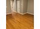 Cozy living room features hardwood floors at 1295 Kilmington Ct, Alpharetta, GA 30009