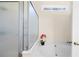Elegant bathtub and shower area featuring natural light and a stylish orchid at 401 Azalea Cv, Canton, GA 30114