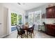 Eat-in kitchen dining area with sliding glass door at 401 Azalea Cv, Canton, GA 30114