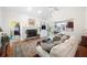 Comfortable living room with fireplace and lots of natural light at 401 Azalea Cv, Canton, GA 30114