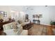 Comfortable living room featuring a vaulted ceiling, neutral paint, and a cozy seating arrangement at 401 Azalea Cv, Canton, GA 30114