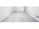 Unfinished basement with neutral carpet offering potential for customization at 10 Hollow Ct, Covington, GA 30016