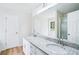 Bathroom with double sink vanity, granite countertops, and a separate shower and bathtub at 10 Hollow Ct, Covington, GA 30016