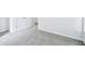 Large primary bedroom features fresh paint, neutral carpeting, and great natural light at 10 Hollow Ct, Covington, GA 30016