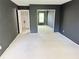 Bedroom featuring a large closet with mirrored sliding doors and neutral carpet at 1818 Huntingdon Chase, Atlanta, GA 30350