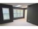 Bedroom with two large windows providing plenty of natural light and grey walls at 1818 Huntingdon Chase, Atlanta, GA 30350