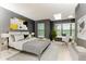 Stylish bedroom featuring ample natural light and a dedicated workspace for comfort and productivity at 1818 Huntingdon Chase, Atlanta, GA 30350