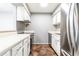 Functional kitchen featuring white cabinets, modern appliances, and durable countertops at 1818 Huntingdon Chase, Atlanta, GA 30350