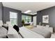 Bright main bedroom with a skylight, large windows, and stylish decor at 1818 Huntingdon Chase, Atlanta, GA 30350