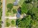 A high angle view of the house and its surroundings, including roads and trees at 302 Davis Rd, Stockbridge, GA 30281