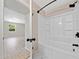 Bathroom features a full shower, marble floors, and access to an additional room at 302 Davis Rd, Stockbridge, GA 30281