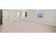 Bright, open bedroom with hardwood floors and ample closet space at 302 Davis Rd, Stockbridge, GA 30281