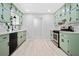 Charming kitchen boasts updated appliances, countertops, and flooring, with ample cabinet space and a modern design at 302 Davis Rd, Stockbridge, GA 30281