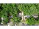 Aerial view of the home and its lot, showcasing mature trees and the neighborhood at 3311 Creek Hollow Dr, Marietta, GA 30062