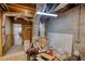Unfinished basement with exposed ceiling and a lot of storage space at 3311 Creek Hollow Dr, Marietta, GA 30062