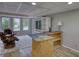 Basement with a unique bar, comfortable seating, and built-in entertainment center at 3311 Creek Hollow Dr, Marietta, GA 30062