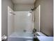 Cozy bathroom with a white tiled shower-tub combination at 3311 Creek Hollow Dr, Marietta, GA 30062