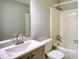 The modern bathroom features a sleek vanity with chrome fixtures and a shower over the tub at 3311 Creek Hollow Dr, Marietta, GA 30062