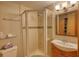 Bright bathroom with tiled shower, modern vanity, and updated fixtures at 3311 Creek Hollow Dr, Marietta, GA 30062