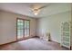 Bedroom with natural light, a ceiling fan, and ample space at 3311 Creek Hollow Dr, Marietta, GA 30062