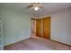 Bedroom featuring a ceiling fan and closet access at 3311 Creek Hollow Dr, Marietta, GA 30062