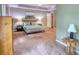 This carpeted main bedroom is spacious and bright, featuring an art piece over the bed at 3311 Creek Hollow Dr, Marietta, GA 30062
