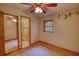 Bedroom featuring a window and doorway to a full bathroom with shower at 3311 Creek Hollow Dr, Marietta, GA 30062