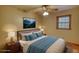 Staged bedroom featuring stylish furniture, soft lighting, and tranquil decor at 3311 Creek Hollow Dr, Marietta, GA 30062