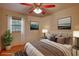 Bright bedroom with large window, stylish decor and a comfortable bed at 3311 Creek Hollow Dr, Marietta, GA 30062