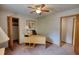Spacious bedroom featuring a desk and an closet for working from home at 3311 Creek Hollow Dr, Marietta, GA 30062