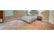 A lovely bedroom with a soft blue bedspread and side tables at 3311 Creek Hollow Dr, Marietta, GA 30062