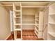 Well-organized walk-in closet with shelves and hanging space for optimal storage at 3311 Creek Hollow Dr, Marietta, GA 30062